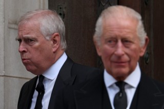 (FILES) Britain's Prince Andrew, Duke of York (L) and Britain's King Charles III leave following a Requiem Mass, a Catholic funeral service, for the late Katharine, Duchess of Kent, at Westminster Cathedral in London on September 16, 2025.