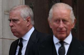(FILES) Britain's Prince Andrew, Duke of York (L) and Britain's King Charles III leave following a Requiem Mass, a Catholic funeral service, for the late Katharine, Duchess of Kent, at Westminster Cathedral in London on September 16, 2025. King Charles will strip his younger brother Andrew of his royal titles and long-term residence, the palace said in a statement on on October 30, 2025. "His Majesty has today initiated a formal process to remove the Style, Titles and Honours of Prince Andrew," it said. "Prince Andrew will now be known as Andrew Mountbatten Windsor," it said, adding that he would also move out of his long-time home on Windsor Castle's sprawling grounds. The announcement followed fresh outrage at accusations made against him by one of Jeffrey Epstein's main accusers, charges he has denied. (Photo by Adrian Dennis / AFP)