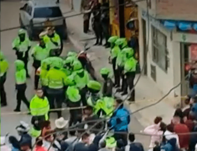 Con su chaleco y su arma, así abatieron a uno de los asesinos de los policías en Bosa.