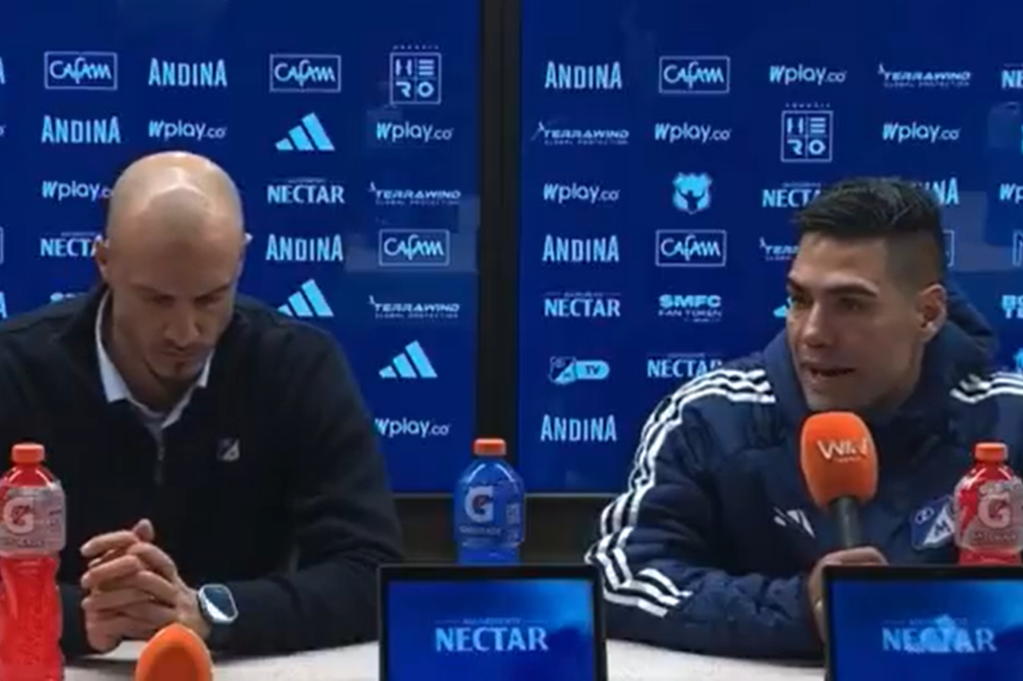 Falcao García (der.), junto al entrenador David González.