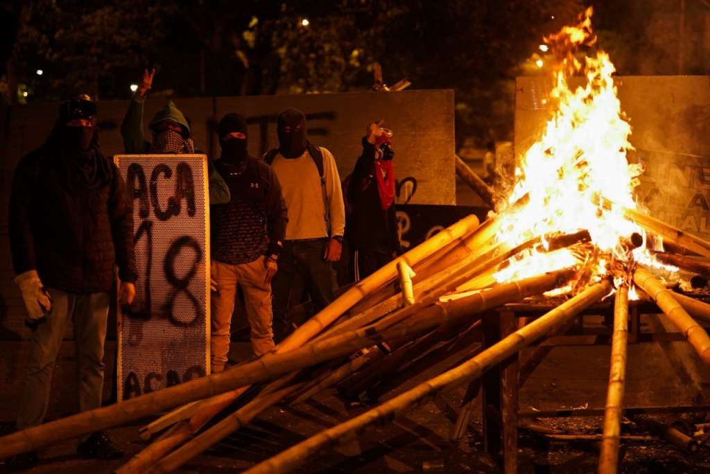 Los jóvenes protestantes de la llamada Primera Línea, en el barrio Meléndez.