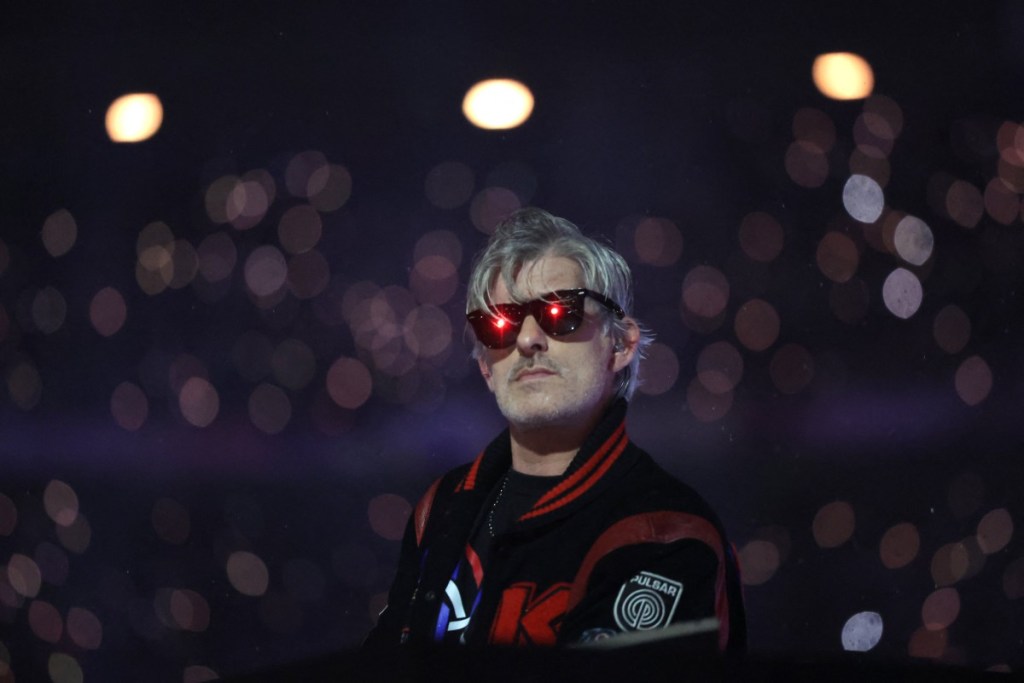 (FILES) French DJ Kavinsky performs on stage during the Paris 2024 Paralympic Games Closing Ceremony at the Stade de France, in Saint-Denis, in the outskirts of Paris, on September 8, 2024. DJ Kavinsky, one of the leading figures of the French electro scene, was found dead at his home in Paris, the public prosecutor�s office said on July 29, 2026 when contacted by AFP, confirming a report from French newspaper Le Parisien. (Photo by Thibaud Moritz / AFP)