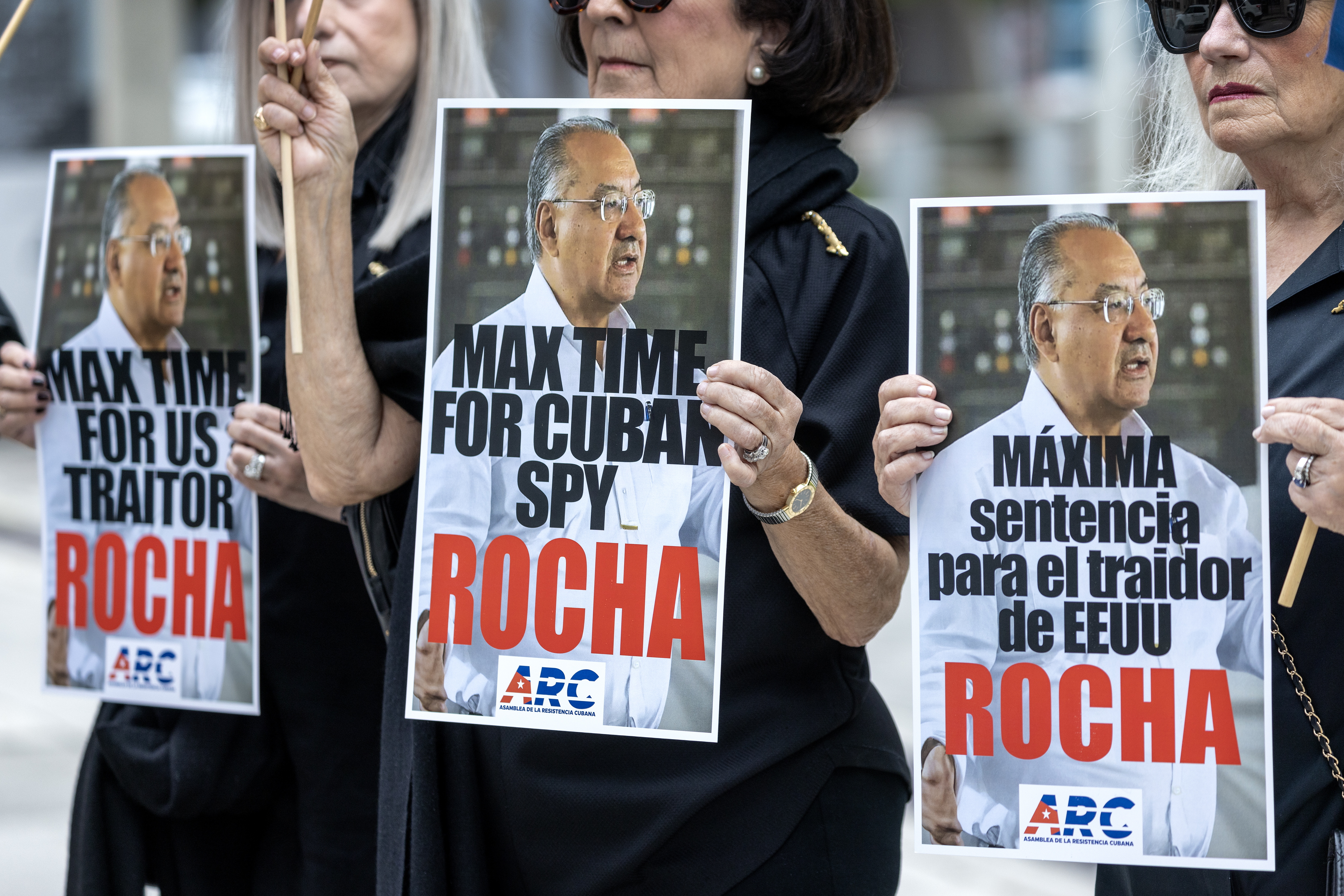 Miami (United States), 09/04/2024.- Members of the Assembly of the Cuban Resistance hold placards during a rally demanding the 'maximum sentence' for former US diplomat and alleged Cuban spy, Victor Rocha, in front of the Federal Court Wilke D. Ferguson Jr., in Miami, Florida, USA, 09 April 2024. Former US diplomat of Colombian origin, Victor Manuel Rocha, was arrested in Miami in December 2023, accused of secretly serving as an agent of Cuba's government for decades. EFE/EPA/CRISTOBAL HERRERA-ULASHKEVICH