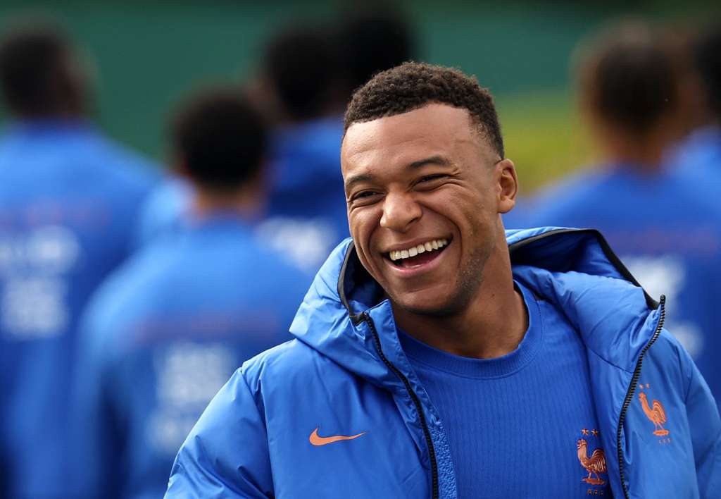 France's forward #10 Kylian Mbappe reacts ahead of a training session at the French Football Federation's (FFF) training ground in Clairefontaine-en-Yvelines, southwest of Paris on June 6, 2026, as part of the team's preparation for upcoming 2026 FIFA World Cup football tournament. (Photo by FRANCK FIFE / AFP)