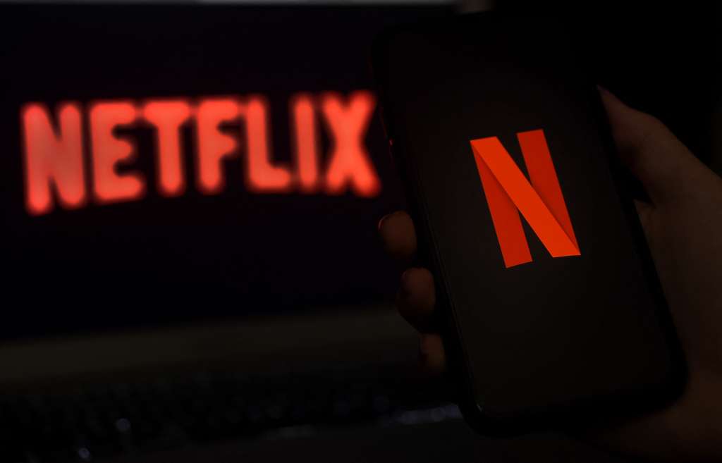 (FILES) In this photo illustration a computer screen displays the Netflix logo on March 31, 2020 in Arlington, Virginia.