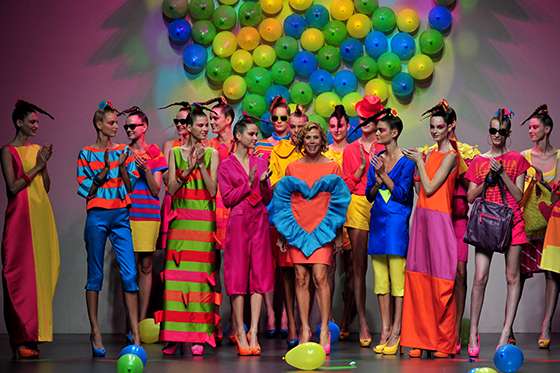 17 Sep 2011 --- (110917) -- MADRID, Sept. 17, 2011 (Xinhua) -- Models present creations by Spanish designer Agatha Ruiz De La Prada (C) during Cibeles Madrid Fashion Week Spring/Summer 2012 show in Madrid, capital of Spain, on Sept. 17, 2011. (Xinhua/Chen Haitong) (lr) | Location: Madrid. --- Image by © Chen Haitong/Xinhua Press/Corbis