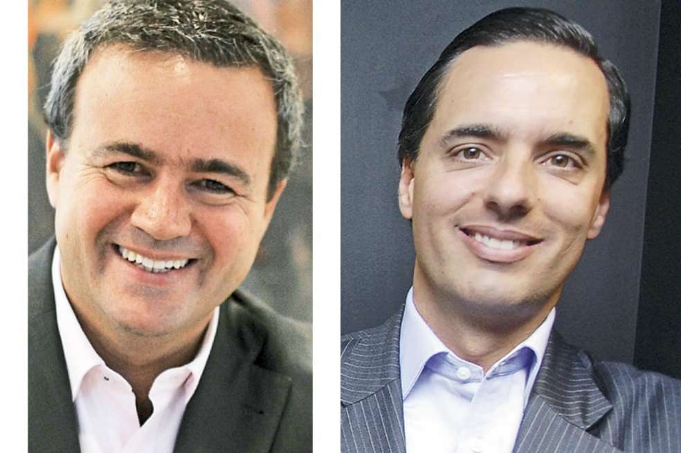 Esteban Iriarte, presidente de Tigo Colombia y Alfonso Gómez, presidente de Telefónica, dueña de Movistar.