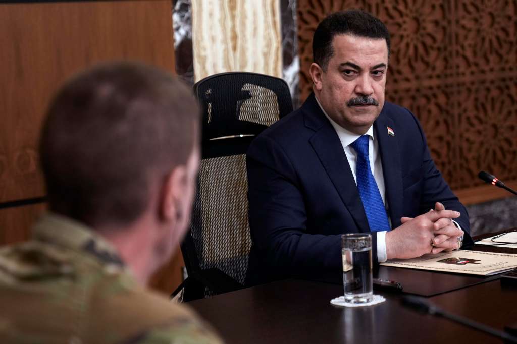 Baghdad (Iraq), 27/01/2024.- Iraqi Prime Minister Mohammed Shia al-Sudani (R) chairs the first session of talks between Iraq and the United States to wind down the International Coalition mission in Baghdad, Iraq, 27 January 2024. (Estados Unidos, Bagdad) EFE/EPA/HADI MIZBAN / POOL