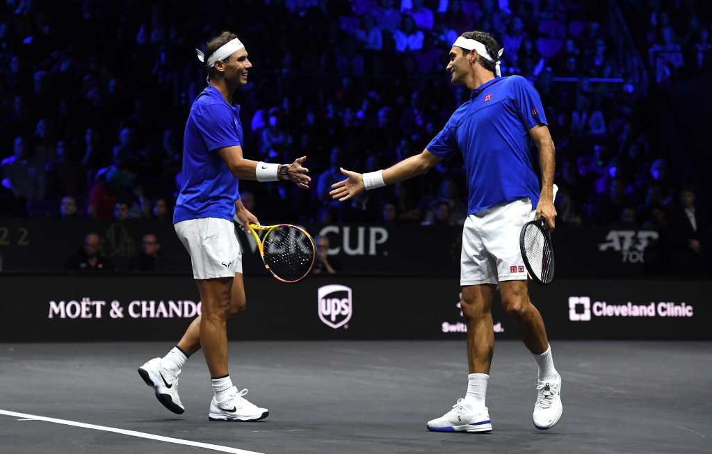 London (United Kingdom), 23/09/2022.- Team Europe double Roger Federer (R) of Switzerland and Rafael Nadal of Spain celebrate winning a point in their match against Team World double Jack Sock of the US and Frances Tiafoe of the US on the first day of the Laver Cup tennis tournament in London, Britain, 23 September 2022. (Tenis, Francia, España, Suiza, Reino Unido, Londres) EFE/EPA/ANDY RAIN