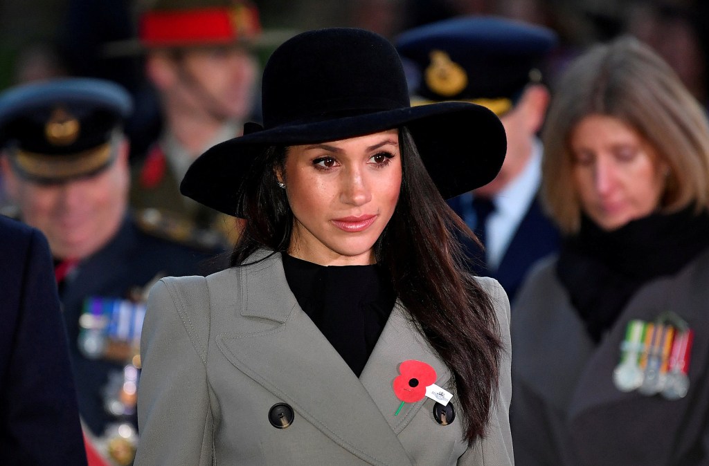Meghan Markle, the US fiancee of Britain's Prince Harry, attends an Anzac Day dawn service at Hyde Park Corner in London on April 25, 2018.
Anzac Day commemorates Australian and New Zealand casualties and veterans of conflicts and marks the anniversary of the landings in the Dardanelles on April 25, 1915 that would signal the start of the Gallipoli Campaign during the First World War. / AFP PHOTO / POOL / TOBY MELVILLE