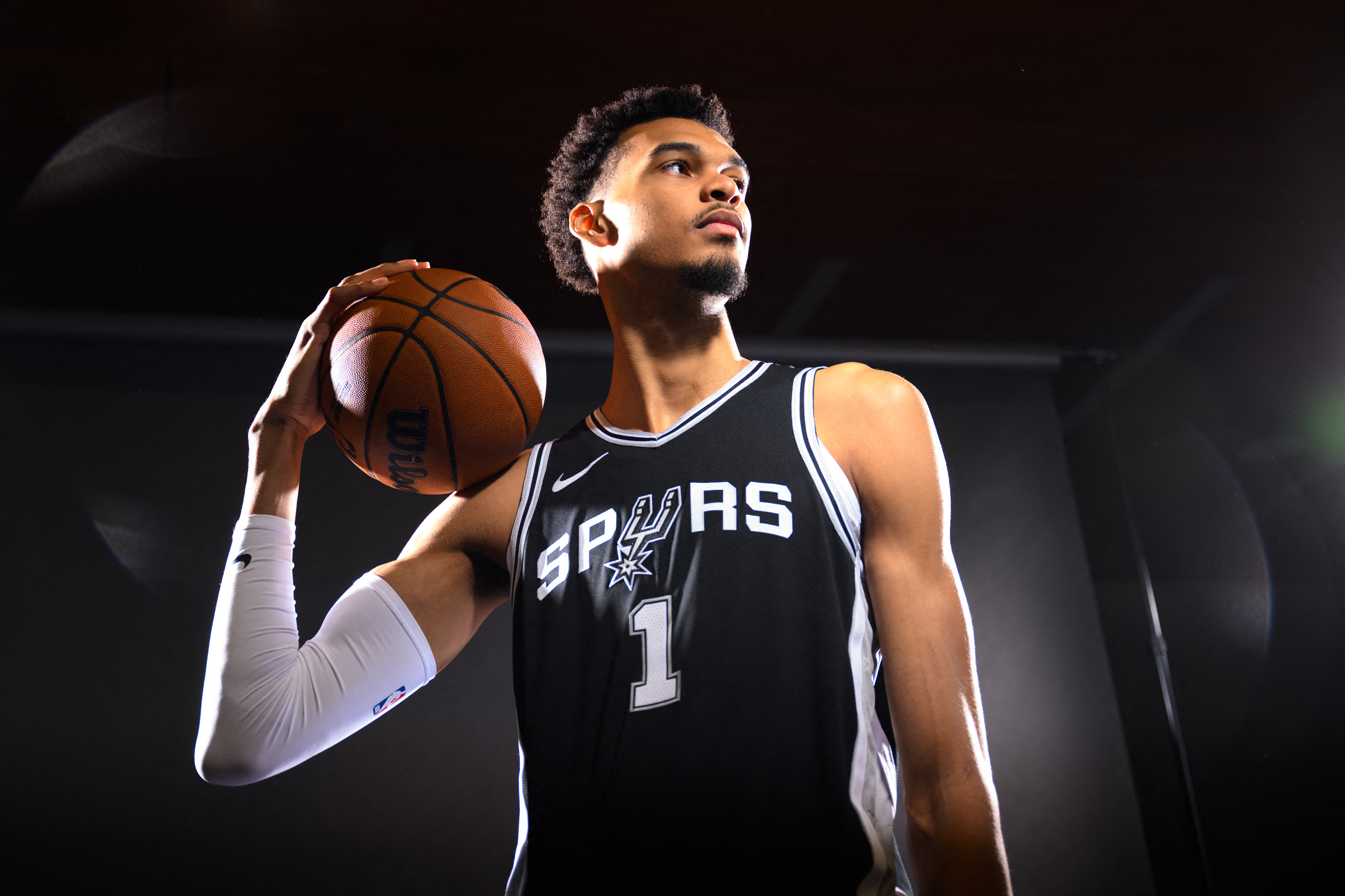 (FILES) San Antonio Spurs forward #01 Victor Wembanyama stands for a portrait during media day ahead of the NBA season at the Victory Capital Performance Center in San Antonio, Texas, September 30, 2024.