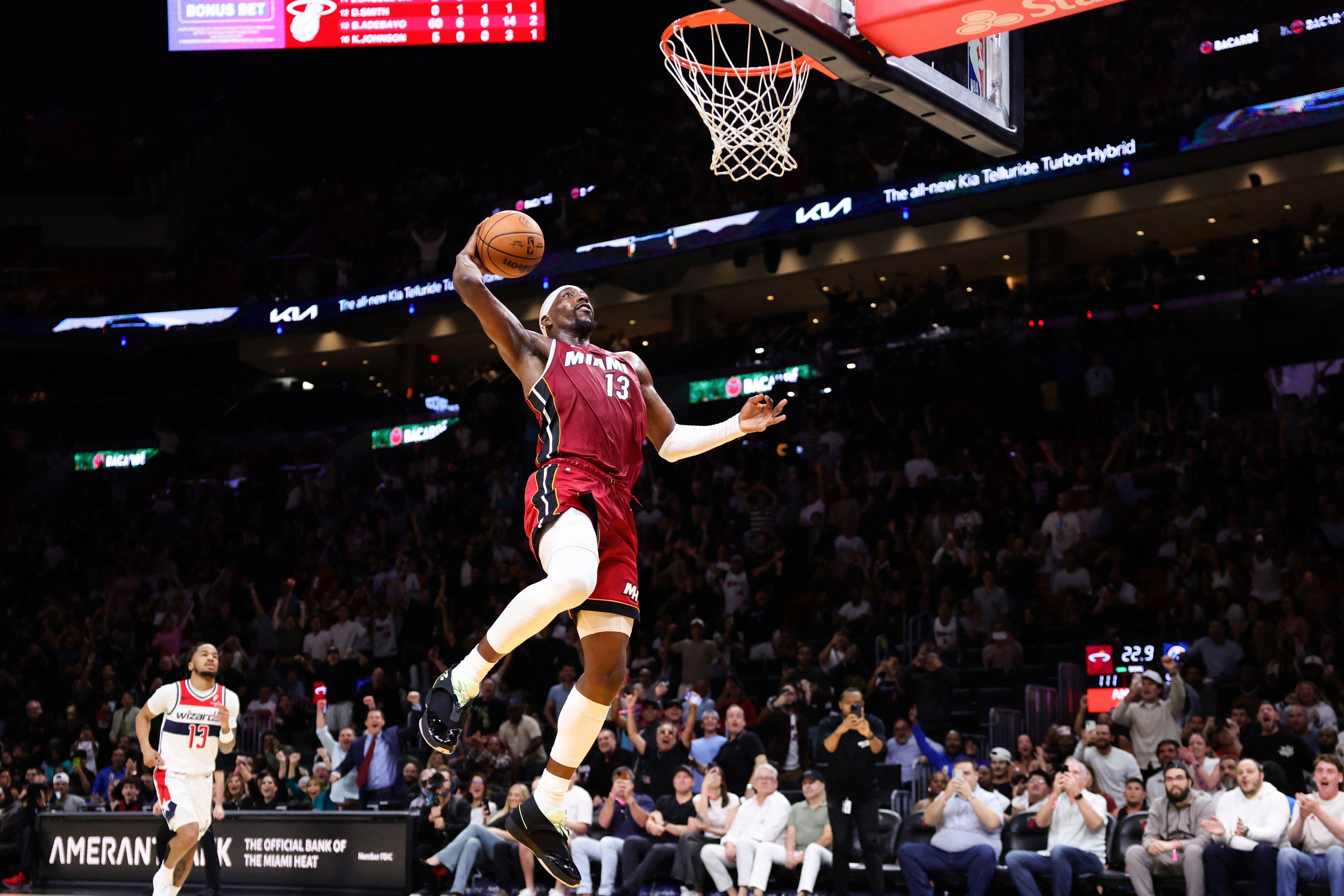 MIAMI, FLORIDA - MARCH 10: Bam Adebayo #13 of the Miami Heat dunks the ball against the Washington Wizards during the third quarter of the game at Kaseya Center on March 10, 2026 in Miami, Florida. NOTE TO USER: User expressly acknowledges and agrees that, by downloading and or using this photograph, User is consenting to the terms and conditions of the Getty Images License Agreement. Megan Briggs/Getty Images/AFP (Photo by Megan Briggs / GETTY IMAGES NORTH AMERICA / Getty Images via AFP)