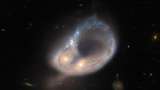 El telescopio espacial Hubble muestra el resultado de la colisión de dos galaxias