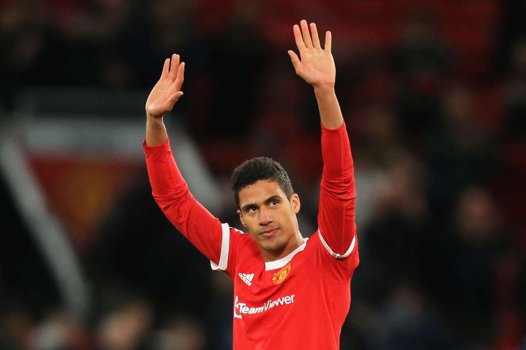 (FILES) Manchester United's French defender Raphael Varane gestures to supporters on the pitch after the English Premier League football match between Manchester United and Tottenham Hotspur at Old Trafford in Manchester, north west England, on March 12, 2022.