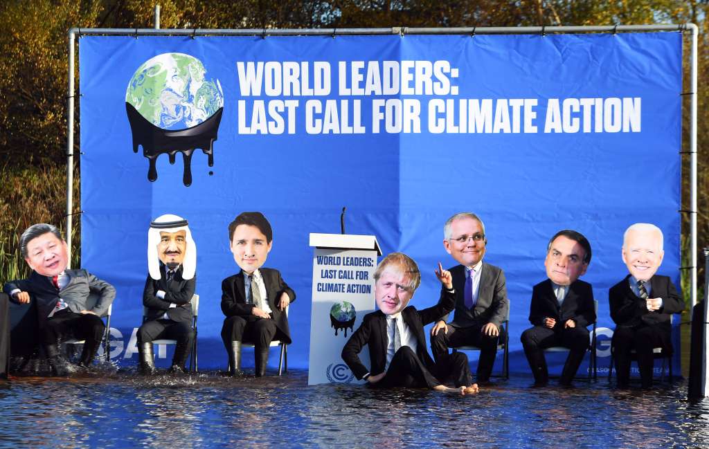 Activistas hacen un llamado a líderes globales para que se comprometan a tomar medidas para enfrentar el cambio climático.