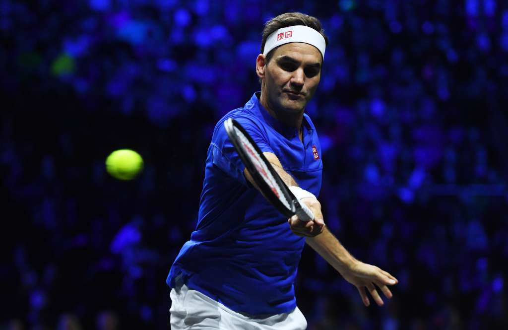 London (United Kingdom), 23/09/2022.- Team Europe Roger Federer of Switzerland hits a backhand in his doubles match with Rafael Nadal (not pitured) of Spain against Team World double Jack Sock of the US and Frances Tiafoe of the US on the first day of the Laver Cup tennis tournament in London, Britain, 23 September 2022. (Tenis, Francia, España, Suiza, Reino Unido, Londres) EFE/EPA/ANDY RAIN