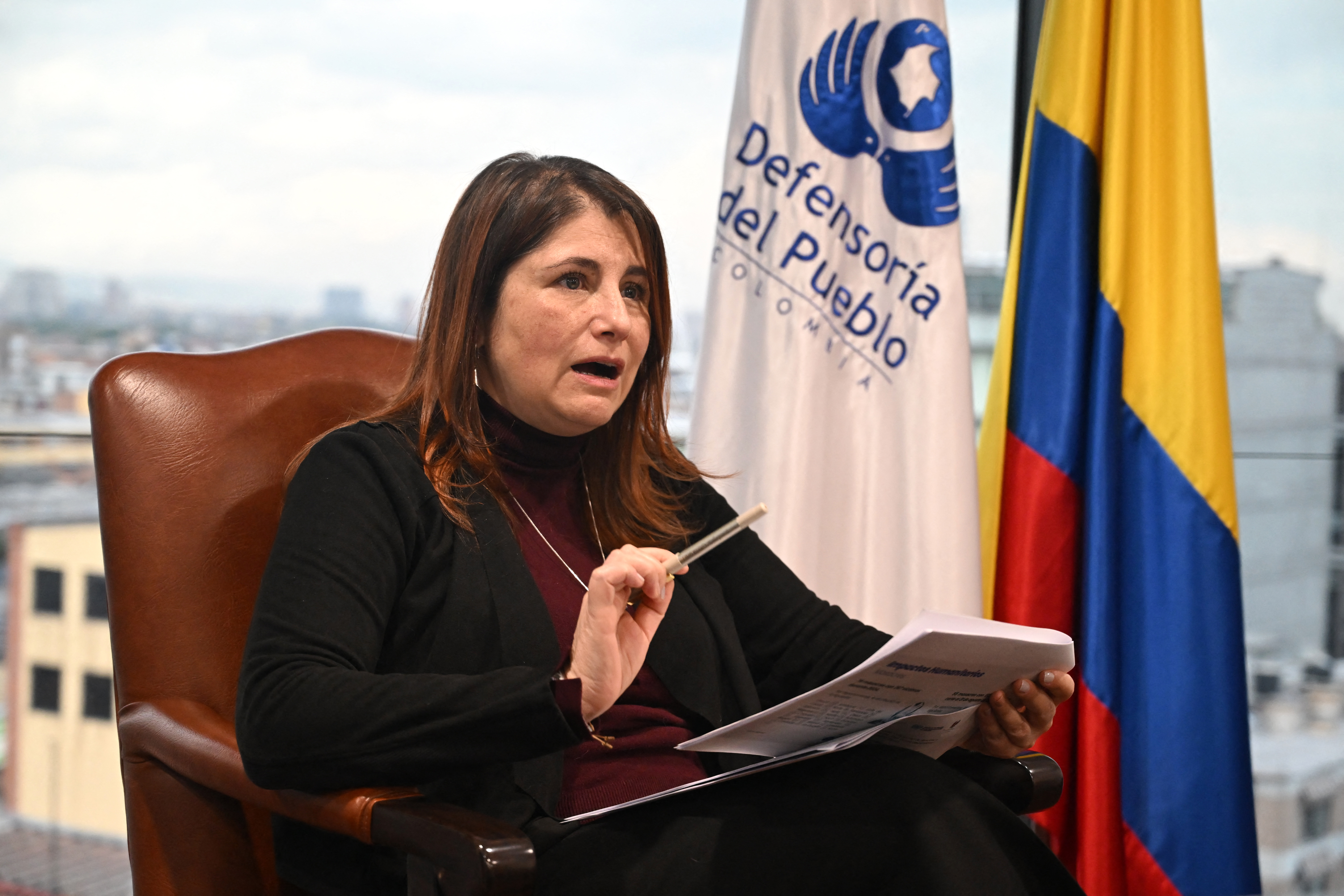 Colombia's Ombudsman executive, Iris Marin Ortiz, gestures as she speaks during an interview with AFP at the Ombudsman's headquarters in Bogota on October 6, 2025.