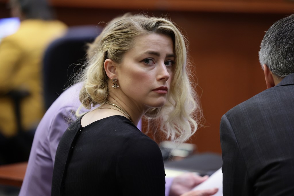 Fairfax (United States), 01/06/2022.- Actor Amber Heard waits before the jury's verdict in the Depp v. Heard civil defamation trial at the Fairfax County Circuit Courthouse in Fairfax, Virginia, USA, 01 June 2022. The jury found that US actor Johnny Depp was defamed by his ex-wife, US actor Amber Heard, in his 50 million US dollar defamation lawsuit against her and awarded him with 15 million US dollars. The jury also found that Heard was defamed by Depp through his former attorney, Adam Waldman, and awarded her with two million US dollars. (Estados Unidos) EFE/EPA/EVELYN HOCKSTEIN / POOL