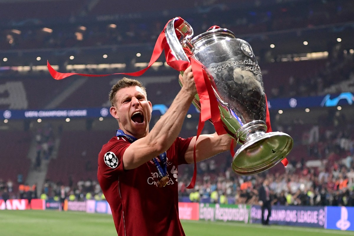 (FILES) Liverpool's English midfielder James Milner raises the trophy after winning the UEFA Champions League final football match between Liverpool and Tottenham Hotspur at the Wanda Metropolitano Stadium in Madrid on June 1, 2019.