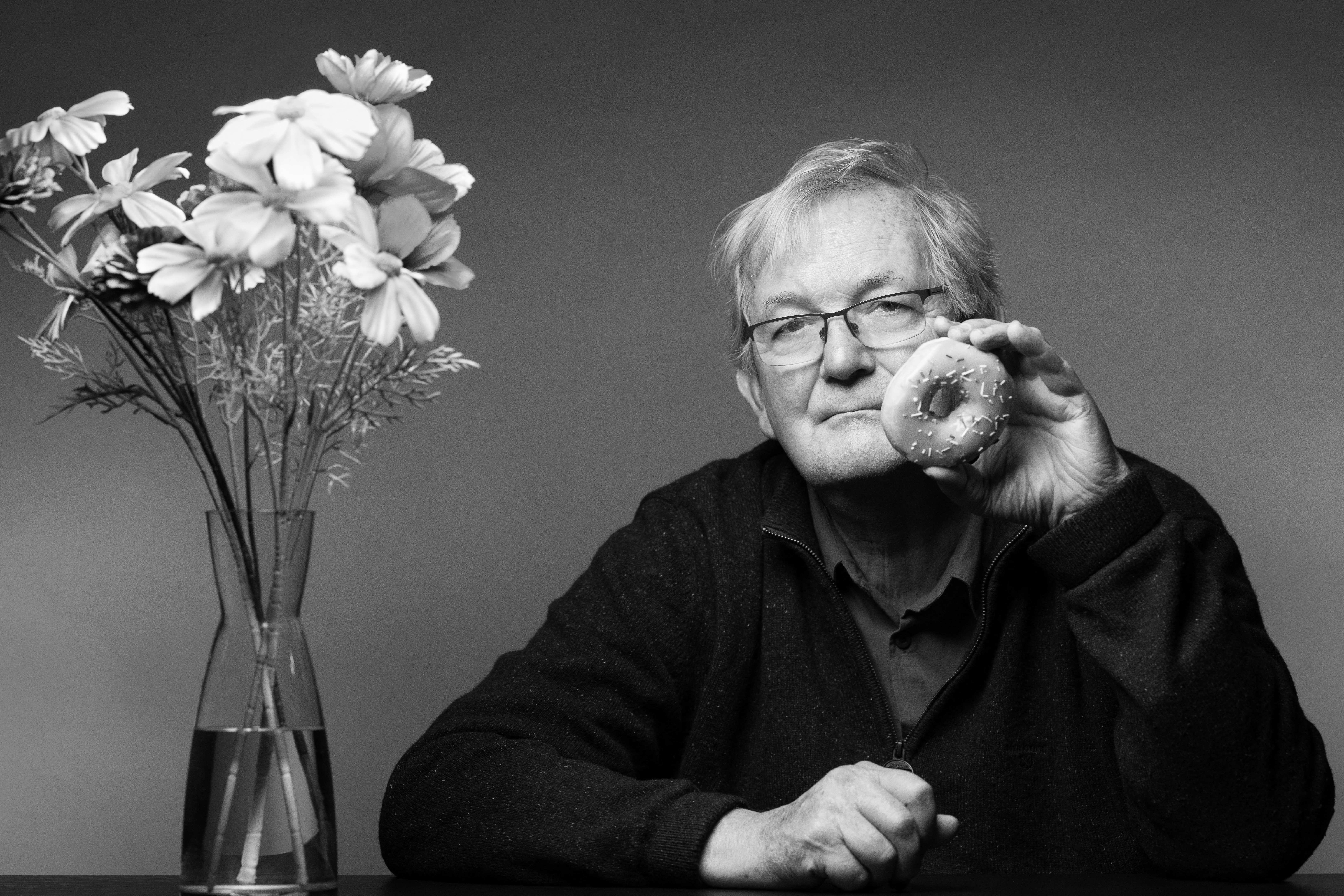 British documentary photographer Martin Parr, poses during a photo session in Paris, on October 31, 2025.