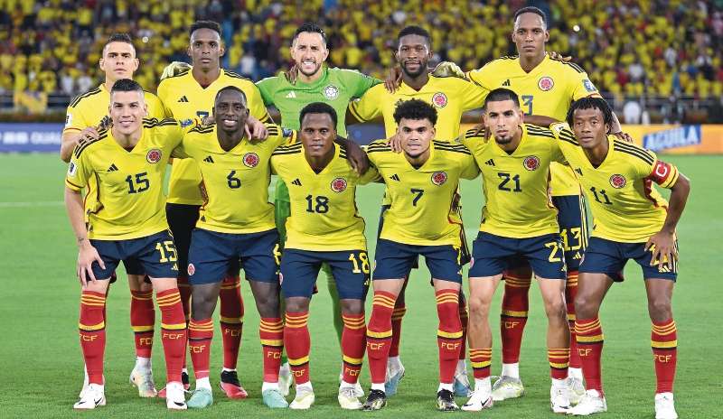 La nómina de Colombia que enfrentó a Venezuela en la primera fecha. Los de arriba, de izquierda a derecha: Rafael Santos Borré, Jhon Lucumí, Camilo Vargas, Jefferson Lerma y Yerry Mina. Los de abajo, de izquierda a derecha: Matheus Uribe, Deiver Machado, John Arias, Luis Díaz, Daniel Muñoz y Juan Guillermo Cuadrado.