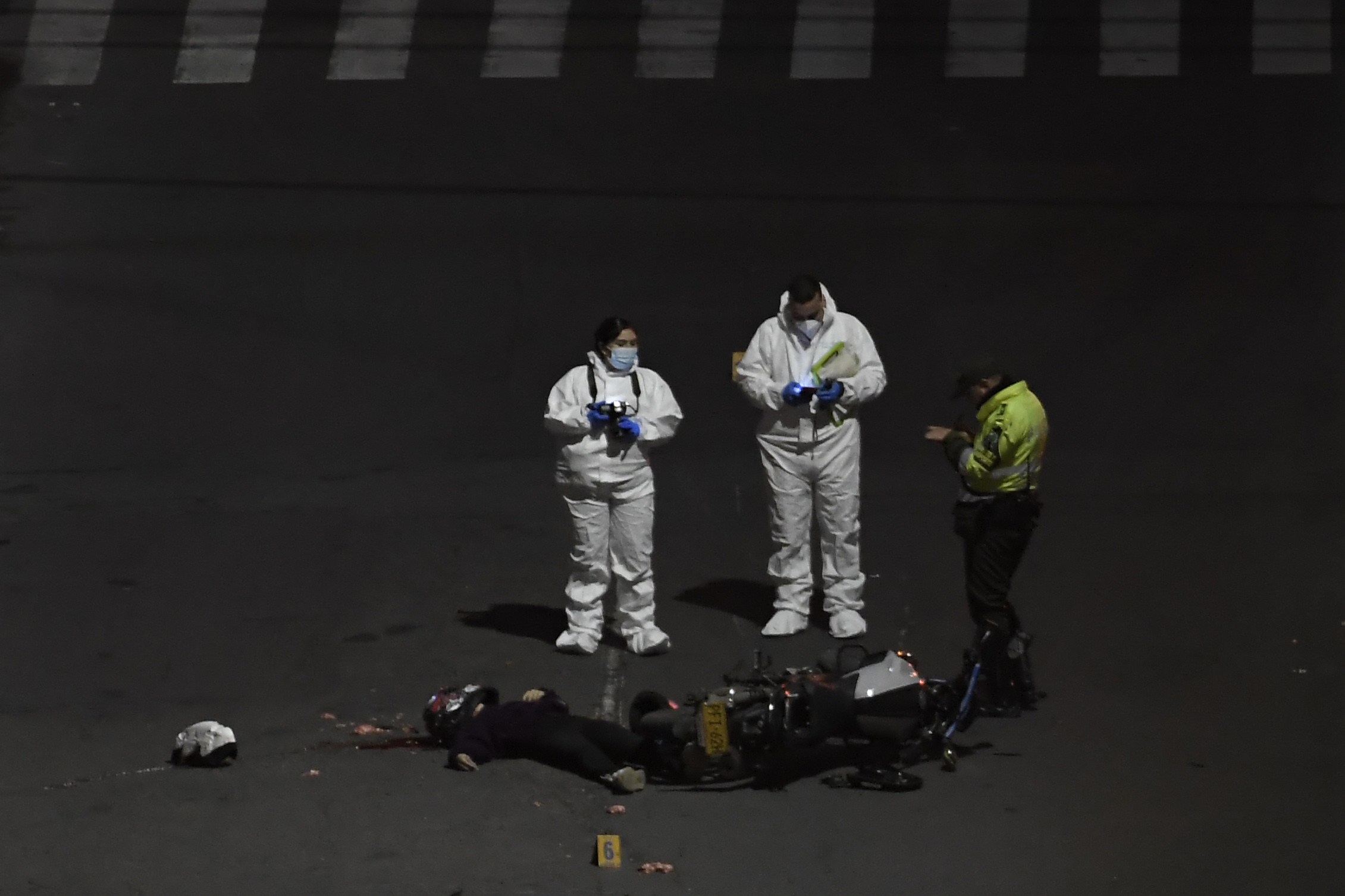 Levantamiento de un cuerpo, causado por un siniestro vial.