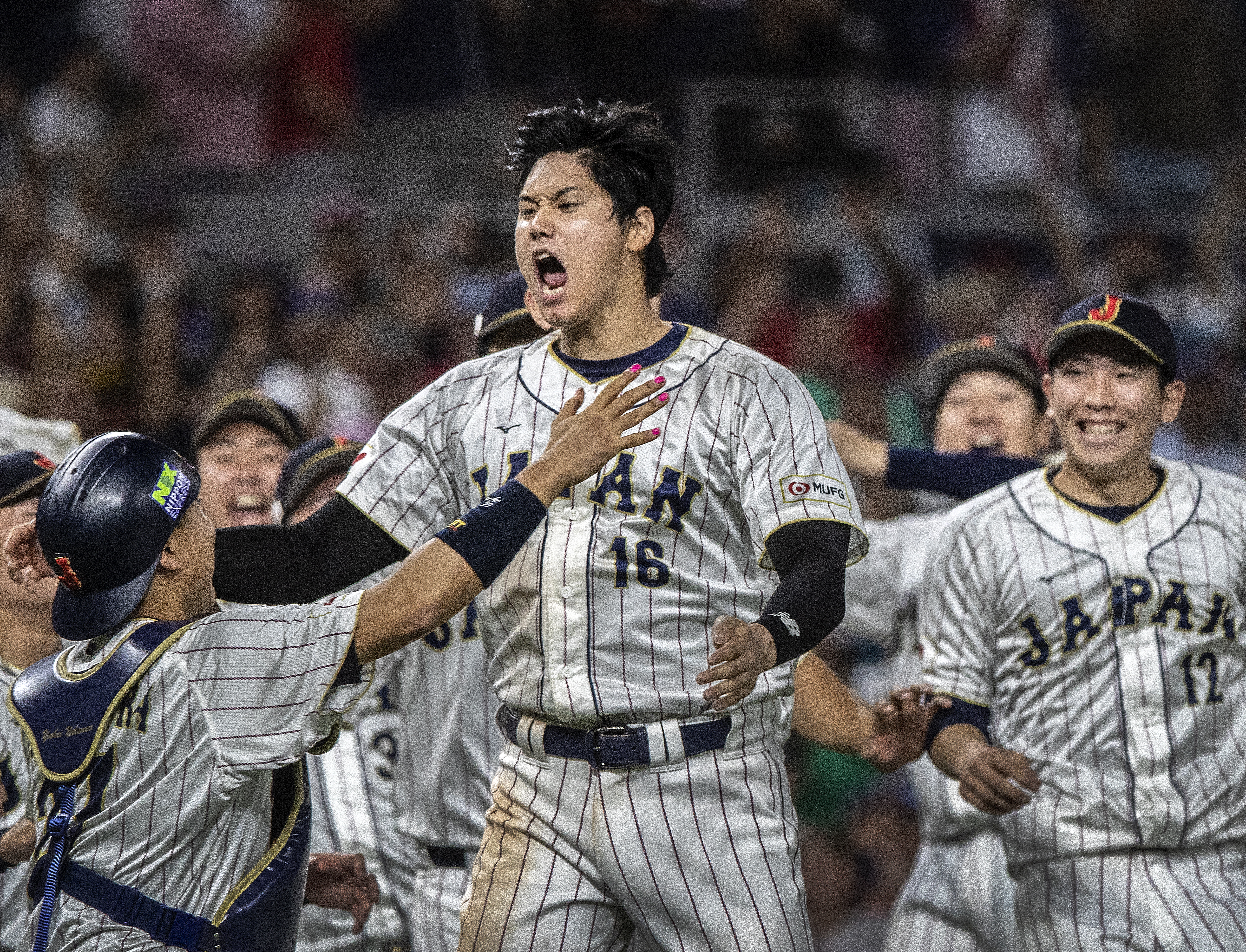 Miami (United States), 21/03/2023.- Japan Shohei Ohtani (C) celebrates with his teammates after winning the 2023 World Baseball Classic Championship final game between USA and Japan at loanDepot park baseball stadium in Miami, Florida, USA, 21 March 2023. (Japón, Estados Unidos) EFE/EPA/CRISTOBAL HERRERA-ULASHKEVICH