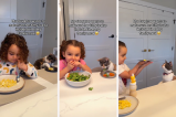Video: una niña y su gato comparten adorable ritual a la hora de comer